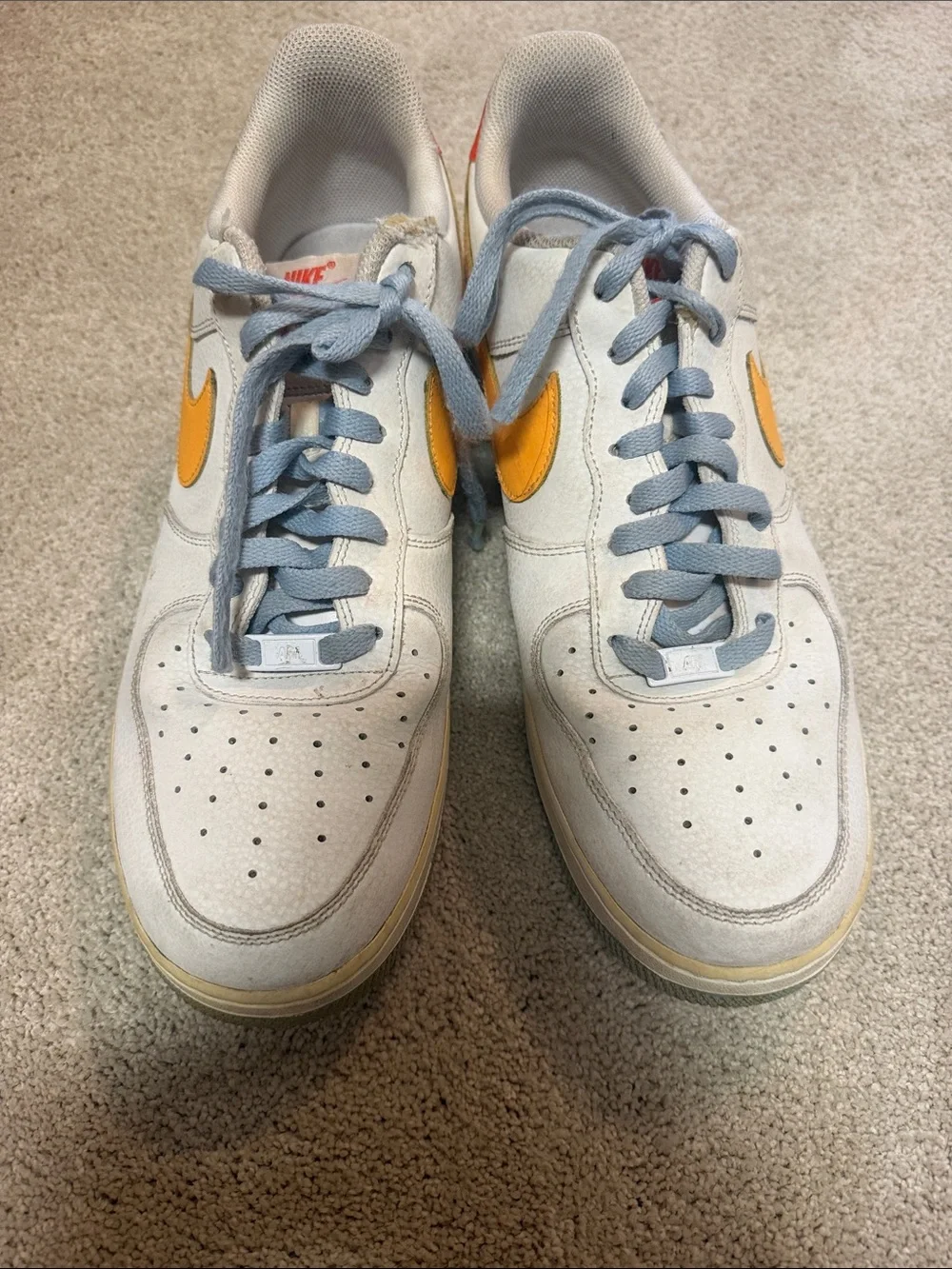 Nike Men’s Air Force One low top White with Yellow Swoosh and Light Blue Laces